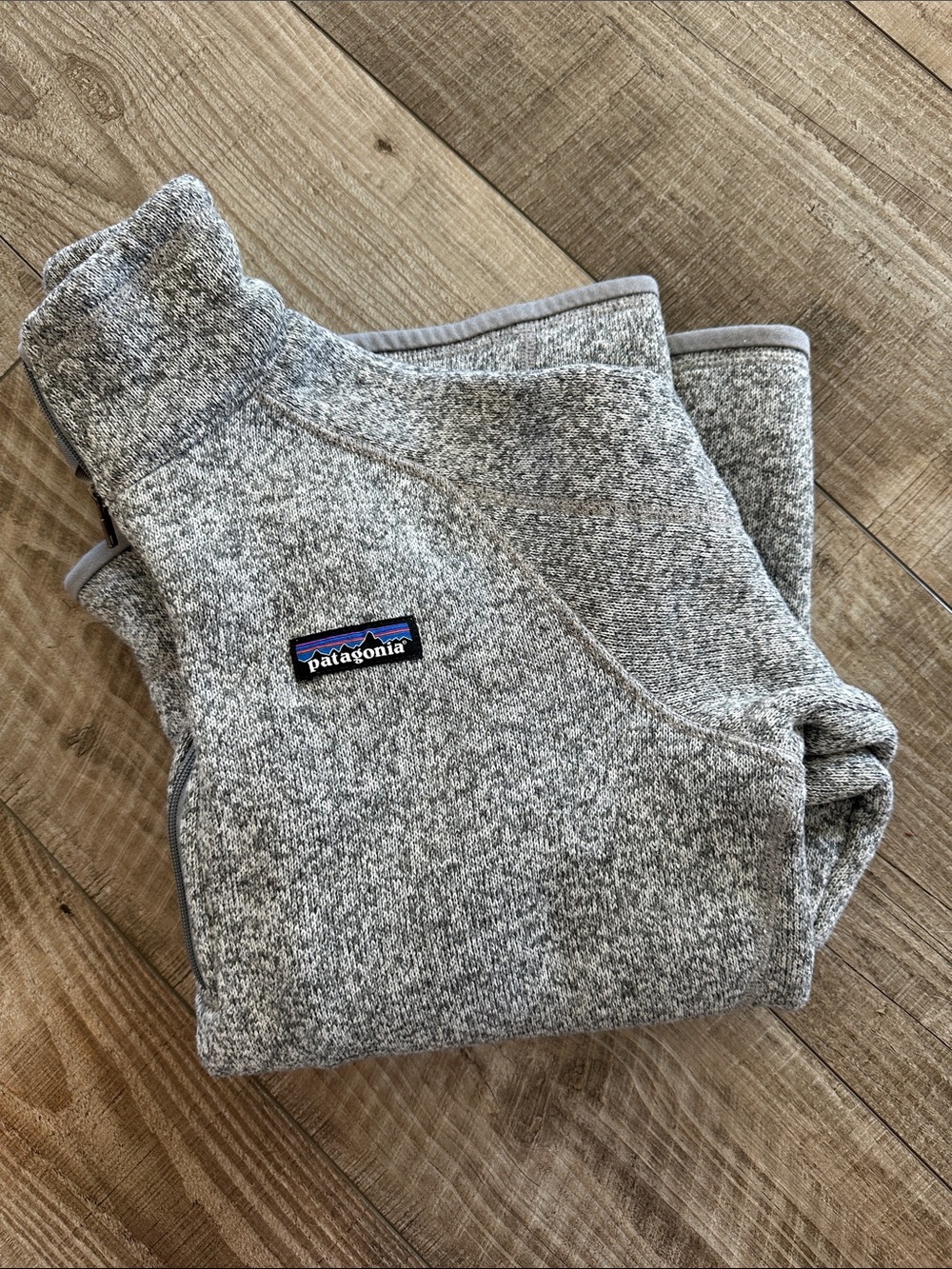 Patagonia woman’s gray 1/4 zip sweater